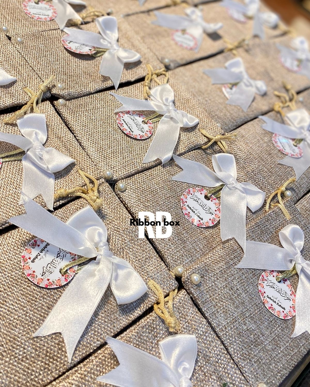 Handmade Jute Potli Bag With Custom Tag & Bow | Wedding Bidh Potli Bags view 1