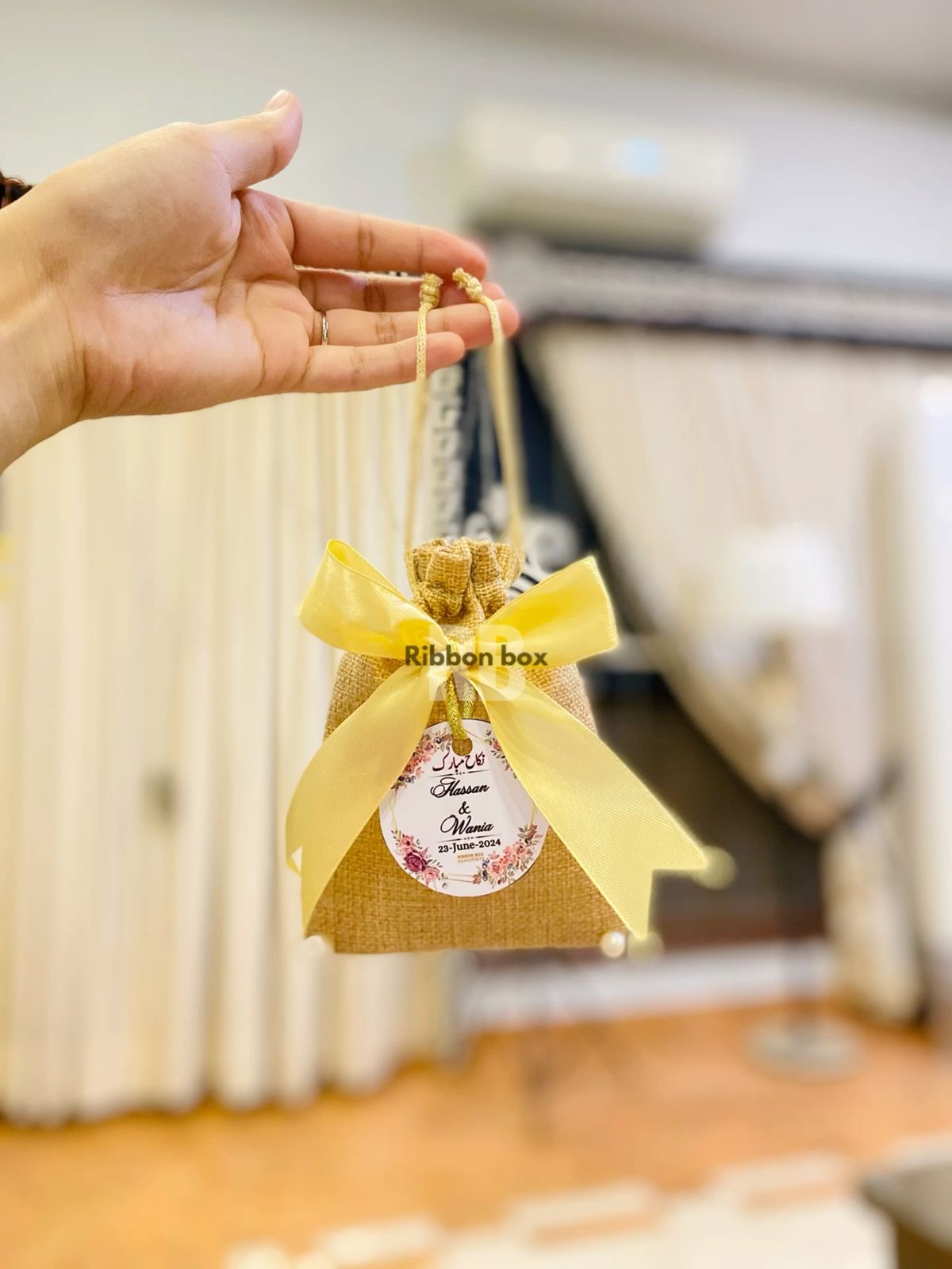 Handmade Jute Potli Bag With Custom Tag & Bow | Wedding Bidh Potli Bags view 1